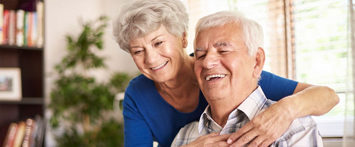happy-grandparents-using-their-digital-laptop-1-1